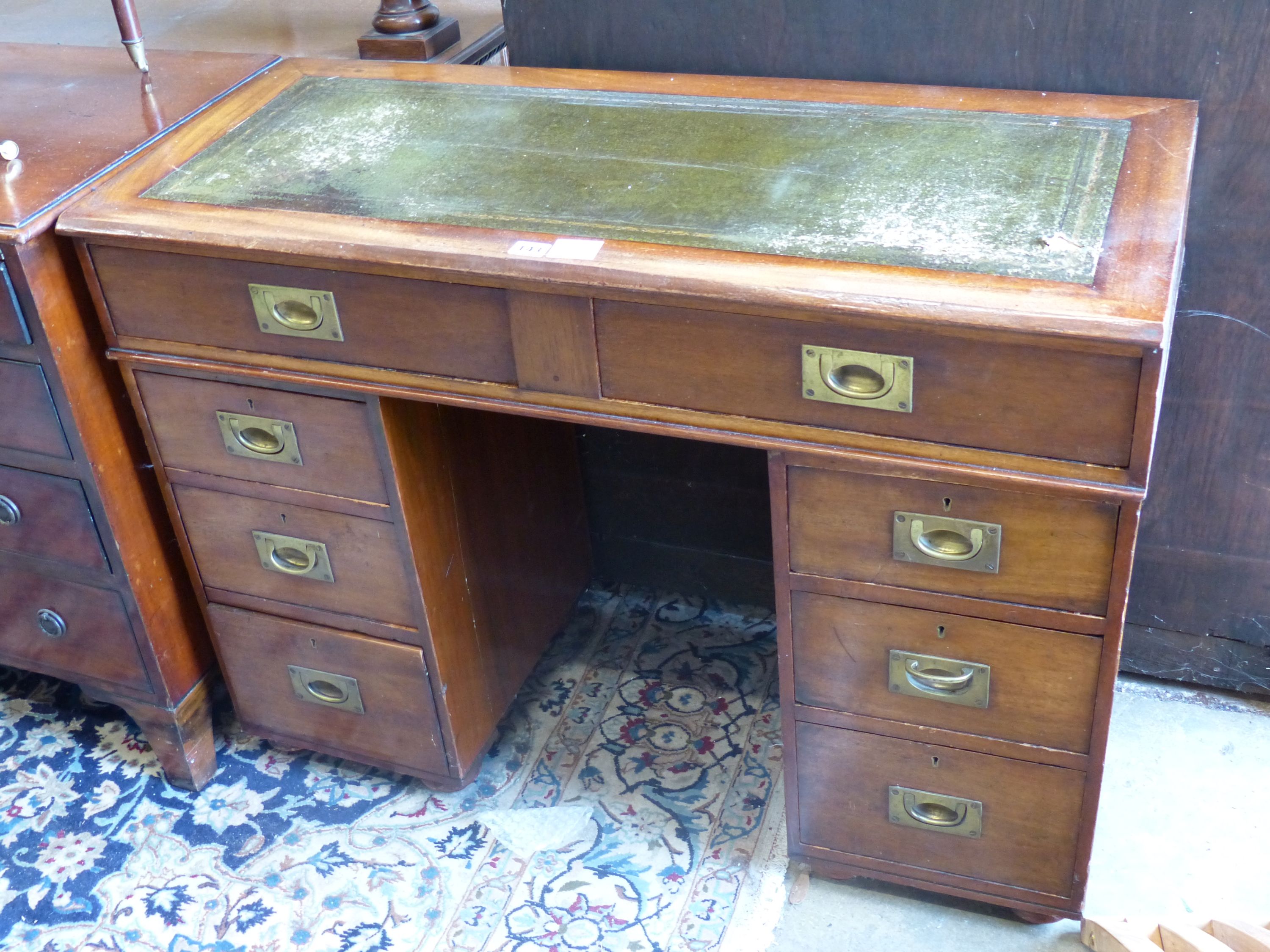 A small mahogany military style pedestal desk, length 99cm, width 42cm, height 73cm